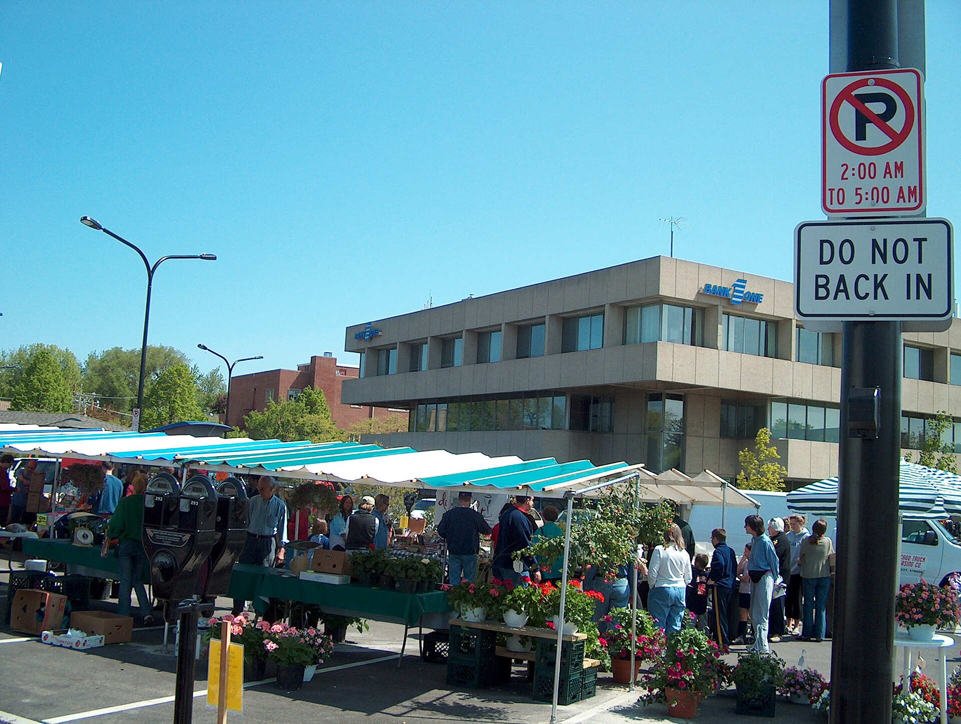 Vendor tents at a busy outdoor event