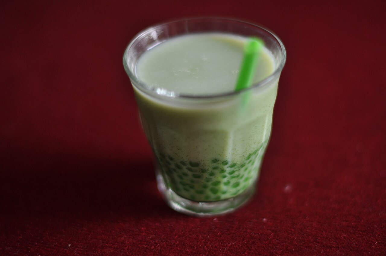 Bright green matcha bubble tea with black tapioca pearls
